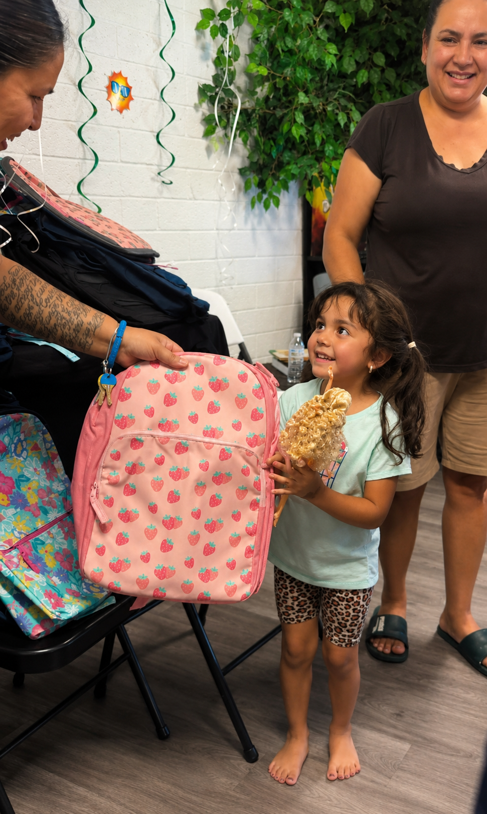 Children at North Mountain Foothills with their new backpacks and school supplies from the Summer Party